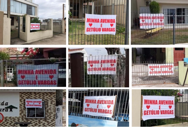 Moradores e empresários da Avenida Getúlio Vargas colaram cartazes e adesivos em protesto a troca de nome da rua